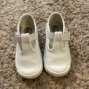 Keds Little Kid's Champion Toe Cap T-Strap Sneaker.
White Size 6